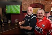 7 June 2015; Collie Curtain, right, and Mick Ryan, from Charleville, Co. Cork, watch the Republic of Ireland v England game in Hayes' Hotel, Thurles. Munster GAA Hurling Senior Championship Semi-Final, Waterford v Cork. Hayes' Hotel, Thurles, Co. Tipperary. Picture credit: Stephen McCarthy / SPORTSFILE