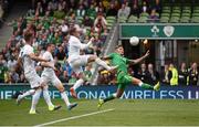 7 June 2015; Jeff Kendrick, Republic of Ireland, stretches to reach the ball ahead of Wayne Rooney, England. Three International Friendly, Republic of Ireland v England. Aviva Stadium, Lansdowne Road, Dublin. Photo by Sportsfile