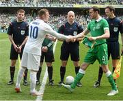 7 June 2015; Wayne Rooney, England captain, shakes hands with John O'Shea, Republic of Ireland captain. Three International Friendly, Republic of Ireland v England. Aviva Stadium, Lansdowne Road, Dublin. Picture credit: David Maher / SPORTSFILE