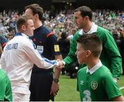 7 June 2015; Wayne Rooney, England captain, shakes hands with John O'Shea, Republic of Ireland captain. Three International Friendly, Republic of Ireland v England. Aviva Stadium, Lansdowne Road, Dublin. Picture credit: David Maher / SPORTSFILE