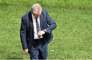 7 June 2015; England manager Roy Hodgson checks his watch during the game. Three International Friendly, Republic of Ireland v England. Aviva Stadium, Lansdowne Road, Dublin. Picture credit: Ramsey Cardy / SPORTSFILE
