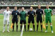 7 June 2015; England captain Wayne Rooney and Republic of Ireland captain John O'Shea with officials from left, Gareth Eakin, Rob Roberts, referee Arnold Hunter and Robert Storey. Three International Friendly, Republic of Ireland v England. Aviva Stadium, Lansdowne Road, Dublin. Picture credit: David Maher / SPORTSFILE