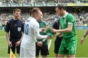 7 June 2015; England captain Wayne Rooney shakes hands with Republic of Ireland captain John O'Shea. Three International Friendly, Republic of Ireland v England. Aviva Stadium, Lansdowne Road, Dublin. Picture credit: David Maher / SPORTSFILE
