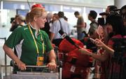 2 August 2008; Eileen O'Keeffe, women’s hammer, is interviewed by journalists on her arrival with members of the Irish Olympic team in Beijing Capital Airport. Beijing 2008 - Games of the XXIX Olympiad, Beijing Capital Airport, Beijing, China. Picture credit: Brendan Moran / SPORTSFILE