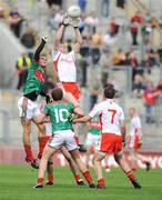 2 August 2008; Enda McGinley and Philip Jordan, 7, Tyrone, in action against Tom Parsons, left, and Andy Moran, Mayo. All-Ireland Senior Football Championship Qualifier, Round 3, Tyrone v Mayo, Croke Park, Dublin. Picture credit: Matt Browne / SPORTSFILE