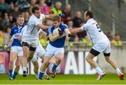 6 June 2015; Mark Timmons, Laois, in action against Padraig O'Neill, left, and Kevin Murnaghan, Kildare. Leinster GAA Football Senior Championship Quarter-Final, Kildare v Laois. O'Connor Park, Tullamore, Co. Offaly. Picture credit: Piaras Ó Mídheach / SPORTSFILE