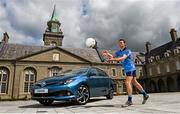 8 June 2015; Pictured is Dublin footballer Darren Daly celebrating the launch of Summer Showtime for Toyota, the official car partner to Dublin GAA, which begins on 10th June and runs until 13th June. The annual Showtime event will see Toyota showcase its full '152' commercial and passenger model line-up including the new Avensis, the new Auris and the RAV4, and providing entertainment and fun activities for all the family. During Showtime, Toyota dealers are also offering a trade up allowance offer of up to €3,000 on passenger cars registered by July 31st, or three years free servicing on passenger cars ordered before June 19th. For further information www.toyota.ie. Royal Hospital Kilmainham, Dublin. Picture credit: Ramsey Cardy / SPORTSFILE