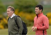 25 May 2015; Rory McIlroy with coach Michael Bannon, left, during a practice round. Dubai Duty Free Irish Open Golf Championship 2015, Practice Day 1. Royal County Down Golf Club, Co. Down. Picture credit: Oliver McVeigh / SPORTSFILE