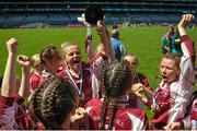 9 June 2015; Players from Holy Family S.N.S River Valley, Swords, celebrate after winnning the Corn Nuri. Holy Family S.N.S River Valley, Swords v St. Bridgets GNS, Glasnevin, Allianz Cumann na mBunscol Finals. Croke Park, Dublin. Picture credit: Eoin Noonan / SPORTSFILE