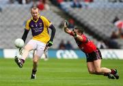 2 August 2008; Brenda Doyle, Wexford, in action against Ronan Murtagh, Down. All-Ireland Senior Football Championship Qualifier, Round 3, Down v Wexford, Croke Park, Dublin. Picture credit: Oliver McVeigh / SPORTSFILE