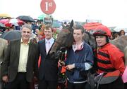 31 July 2008; Jockey Denis O'Regan and winning connections after winning the St. James's Gate Novice Hurdle, onboard Define. Galway Racing Festival - Thursday, Ballybrit, Co. Galway. Picture credit: Stephen McCarthy / SPORTSFILE