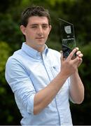 11 June 2015; Tipperary U21 footballer Colin O’Riordan with the EirGrid U21 Player of the Year Award for his outstanding performances throughout the EirGrid GAA Football U21 All-Ireland Championship. Herbert Park Hotel, Dublin. Picture credit: Brendan Moran / SPORTSFILE