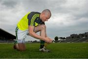 11 June 2015; Kerry's Kieran Donaghy ties his boot laces before squad training. Fitzgerald Stadium, Killarney, Co. Kerry. Picture credit: Diarmuid Greene / SPORTSFILE