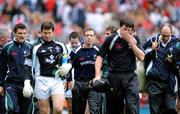 10 August 2008; A disappointed Kieran McGeeney, centre, manager of Kildare walks off the pitch with players and staff at the end of the game. GAA Football All-Ireland Senior Championship Quarter-Final, Cork v Kildare, Croke Park, Dublin. Picture credit: David Maher / SPORTSFILE