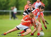 9 August 2008; Maura Kelly, Tyrone, in action against Maeve Morriarty, Armagh. TG4 All-Ireland Ladies Senior Football Championship Qualifier, Round 2, Tyrone v Armagh, Dromard GAA Club, Legga, Co. Longford. Picture credit: Matt Browne / SPORTSFILE