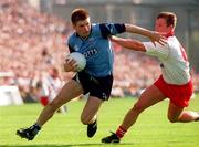 17 September 1995; Dessie Farrell of Dublin is tackled by Seamus McCallan of Tyrone during the All Ireland Football Final match between Dublin and Tyrone at Croke Park in Dublin. Picture Credit: Brendan Moran/SPORTSFILE