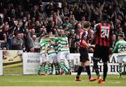 12 June 2015; Kieran Marty Waters, hidden,Shamrock Rovers, celebrates after scoring his side's first goal with team-mates. SSE Airtricity League Premier Division, Bohemians v Shamrock Rovers. Dalymount Park, Dublin. Picture credit: David Maher / SPORTSFILE
