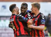12 June 2015; Bohemians players Roberto Lopes, Ismahil Akinade and Derek Prendergast celebrate at the end of the game. SSE Airtricity League Premier Division, Bohemians v Shamrock Rovers. Dalymount Park, Dublin. Picture credit: David Maher / SPORTSFILE