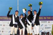 12 June 2015; Winners on the night, from left to right, Puissance joint winner Liam O'Meara, from Co. Tipperary, West Wood for Williams Amateur Speed winner Victoria McKee, from Co. Down, Puissance joint winner Jason Higgins, from Co. Wexford, and Grand Prix winner Alexander Butler, from Co. Kildare. The Underwriting Exchange Ltd 'Jumping In The City' Series - Cork Leg. Curaheen Park Greyhound Stadium, Cork. Picture credit: Diarmuid Greene / SPORTSFILE