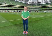 13 June 2015; Pictured is Taylor Lombard, aged 11, from Ardsallagh, Co. Waterford, at the Aviva Stadium. Taylor won a McDonald’s Future Football competition to become a flag bearer for the crucial Ireland v Scotland European Championship Qualifier at the Aviva Stadium. McDonald’s FAI Future Football is a programme designed to support grassroots football clubs by enriching the work they do at local level. Over 10,000 boys and girls from 165 football clubs in Ireland will take part this year, generating 70,000 additional hours of activity. UEFA EURO 2016 Championship Qualifier, Group D, Republic of Ireland v Scotland, Aviva Stadium, Lansdowne Road, Dublin. Picture credit: Ramsey Cardy / SPORTSFILE