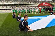 13 June 2015; Pictured is Seán Hickey, aged 8, from Ratoath, Co. Meath, during the pre-match ceremony. Seán won a McDonald’s Future Football competition to become a flag bearer for the crucial Ireland v Scotland European Championship Qualifier at the Aviva Stadium. McDonald’s FAI Future Football is a programme designed to support grassroots football clubs by enriching the work they do at local level. Over 10,000 boys and girls from 165 football clubs in Ireland will take part this year, generating 70,000 additional hours of activity. UEFA EURO 2016 Championship Qualifier, Group D, Republic of Ireland v Scotland, Aviva Stadium, Lansdowne Road, Dublin. Picture credit: David Maher / SPORTSFILE