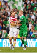 13 June 2015; James McClean, Republic of Ireland, right, and James McArthur, Scotland, embrace after the final whistle. UEFA EURO 2016 Championship Qualifier, Group D, Republic of Ireland v Scotland, Aviva Stadium, Lansdowne Road, Dublin. Picture credit: Seb Daly / SPORTSFILE