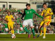 13 June 2015; Kyle Lafferty, Northern Ireland, in action against Dragos Grigore, Romania. UEFA EURO 2016 Championship Qualifier, Group F, Northern Ireland v Romania, Windsor Park, Belfast, Co. Antrim. Picture credit: Oliver McVeigh / SPORTSFILE