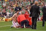 13 June 2015; Scotland's Russell Martin receives medical attention on the sideline after a challenge from Republic of Ireland's James McCarthy. UEFA EURO 2016 Championship Qualifier, Group D, Republic of Ireland v Scotland, Aviva Stadium, Lansdowne Road, Dublin. Picture credit: David Maher / SPORTSFILE
