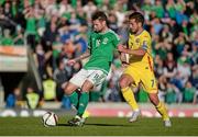 13 June 2015; Oliver Norwood, Northern Ireland, in action against Alexandru Chipcku, Romania. UEFA EURO 2016 Championship Qualifier, Group F, Northern Ireland v Romania, Windsor Park, Belfast, Co. Antrim. Picture credit: Oliver McVeigh / SPORTSFILE
