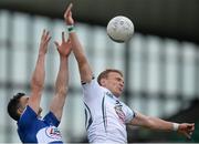 13 June 2015; Tommy Moolick, Kildare, in action against Brendan Quigley, Laois. Leinster GAA Football Senior Championship, Quarter-Final Replay Kildare v Laois. O'Connor Park, Tullamore, Co. Offaly. Picture credit: Piaras Ó Mídheach / SPORTSFILE