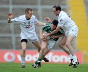 26 July 2008; Ger Collins, Limerick, in action against Alan Smyth, left, and Dermot Earley, Kildare. GAA Football All-Ireland Senior Championship Qualifier, Round 2, Limerick v Kildare, Gaelic Grounds, Limerick. Picture credit: Ray McManus / SPORTSFILE