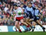 16 August 2008; Davy Harte, Tyrone, bursts past David Henry and Paul Casey, Dublin, on his way to scoring his side's third goal. GAA Football All-Ireland Senior Championship Quarter-Final, Dublin v Tyrone, Croke Park, Dublin. Picture credit: Oliver McVeigh / SPORTSFILE