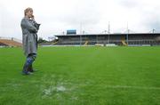 16 August 2008; President of the Camogie association Liz Howard on the pitch at Nowlan Park, Kilkenny, which was unplayable. Gala All-Ireland Camogie Semi-Final, Cork v Tipperary, Nowlan Park, Kilkenny. Picture credit: Pat Murphy / SPORTSFILE