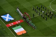 13 June 2015; Pictured are the Republic of Ireland and Scotland flagbearers. McDonald’s FAI Future Football is a programme designed to support grassroots football clubs by enriching the work they do at local level. Over 10,000 boys and girls from 165 football clubs in Ireland will take part this year, generating 70,000 additional hours of activity. UEFA EURO 2016 Championship Qualifier, Group D, Republic of Ireland v Scotland, Aviva Stadium, Lansdowne Road, Dublin. Picture credit: Ramsey Cardy / SPORTSFILE
