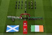 13 June 2015; Pictured are the Republic of Ireland and Scotland flagbearers. McDonald’s FAI Future Football is a programme designed to support grassroots football clubs by enriching the work they do at local level. Over 10,000 boys and girls from 165 football clubs in Ireland will take part this year, generating 70,000 additional hours of activity. UEFA EURO 2016 Championship Qualifier, Group D, Republic of Ireland v Scotland, Aviva Stadium, Lansdowne Road, Dublin. Picture credit: Ramsey Cardy / SPORTSFILE