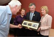 13 June 2015; Special Olympics Ireland boardmember Peter Fitzgerald, left, admires the framed photographs presented to Ronan King, second from right, in recognition of dedication to Special Olympics Ireland between Special Olympics Ireland Chairperson Mary Davis and Special Olympics Ireland CEO Matt English at the Special Olympics AGM 2015. Dublin City University, Glasnevin, Dublin. Picture credit: Cody Glenn / SPORTSFILE