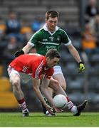 14 June 2015; Jason Collins, Cork, in action against Seamus O'Carroll, Limerick. Munster GAA Football Junior Championship Semi-Final, Cork v Limerick. Páirc Ui Rinn, Cork. Picture credit: Eoin Noonan / SPORTSFILE