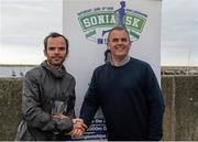 13 June 2015; The Sonia 5k in association with Euromedic Ireland is celebrating the 20 year anniversary of Sonia O'Sullivan's win in the 5000m at the IAAF World Championships in 1995. Pictured is Gary Thornton, Galway City Harriers, being presented with his second place prize by Tom Finn, CEO of Euromedic. Stena Building, Dun Laoghaire, Co. Dublin. Picture credit: Dáire Brennan / SPORTSFILE