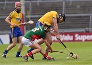 14 June 2015; Jason Kilkenny, Roscommon, in action against David Kenny, Mayo. Christy Ring Cup Promotion / Relegation Play-Off, Mayo v Roscommon. Pearse Stadium, Galway. Picture credit: David Maher / SPORTSFILE
