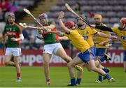 14 June 2015; Stephen Hoban, Mayo, shoots under pressure from Roscommon defenders from left, Tomás Seale, Micheál Kelly and Ian Delaney. Christy Ring Cup Promotion / Relegation Play-Off, Mayo v Roscommon. Pearse Stadium, Galway. Picture credit: Piaras Ó Mídheach / SPORTSFILE