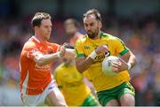 14 June 2015; Karl Lacey, Donegal, in action against Finnian Moriarty, Armagh. Ulster GAA Football Senior Championship Quarter-Final, Armagh v Donegal. Athletic Grounds, Armagh. Picture credit: Brendan Moran / SPORTSFILE