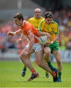 14 June 2015; Mark McHugh, Donegal, in action against Ethan Rafferty, Armagh. Ulster GAA Football Senior Championship Quarter-Final, Armagh v Donegal. Athletic Grounds, Armagh. Picture credit: Brendan Moran / SPORTSFILE