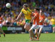 14 June 2015; Christy Toye, Donegal, in action against Jamie Clarke and Tony Kernan, Armagh. Ulster GAA Football Senior Championship Quarter-Final, Armagh v Donegal. Athletic Grounds, Armagh. Picture credit: Oliver McVeigh / SPORTSFILE
