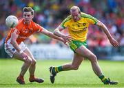 14 June 2015; Neil Gallagher, Donegal, in action against Ciaron O'Hanlon, Armagh. Ulster GAA Football Senior Championship Quarter-Final, Armagh v Donegal. Athletic Grounds, Armagh. Picture credit: Brendan Moran / SPORTSFILE