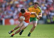 14 June 2015; James Morgan, Armagh, in action against Martin McElhinney, Donegal. Ulster GAA Football Senior Championship Quarter-Final, Armagh v Donegal. Athletic Grounds, Armagh. Picture credit: Brendan Moran / SPORTSFILE