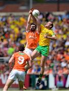 14 June 2015; Aaron Findon, Armagh, in action against Neil Gallagher, Donegal. Ulster GAA Football Senior Championship Quarter-Final, Armagh v Donegal. Athletic Grounds, Armagh. Picture credit: Oliver McVeigh / SPORTSFILE