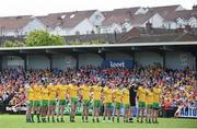 14 June 2015; The Donegal team stand for the national anthem before the game. Ulster GAA Football Senior Championship Quarter-Final, Armagh v Donegal. Athletic Grounds, Armagh. Picture credit: Brendan Moran / SPORTSFILE