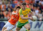 14 June 2015; Patrick McBrearty, Donegal, in action against James Morgan, Armagh. Ulster GAA Football Senior Championship Quarter-Final, Armagh v Donegal. Athletic Grounds, Armagh. Picture credit: Oliver McVeigh / SPORTSFILE