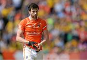 14 June 2015; Aaron Findon, Armagh, leaves the field after receiving a second yellow card and a subsequent Red Card. Ulster GAA Football Senior Championship Quarter-Final, Armagh v Donegal. Athletic Grounds, Armagh. Picture credit: Oliver McVeigh / SPORTSFILE
