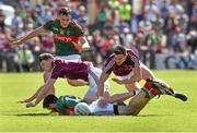 14 June 2015; Kevin McLoughlin and Diarmuid O'Connor, Mayo, in action against Thomas Flynn and Sean Denvir, Galway. Connacht GAA Football Senior Championship Semi-Final, Galway v Mayo. Pearse Stadium, Galway. Picture credit: David Maher / SPORTSFILE